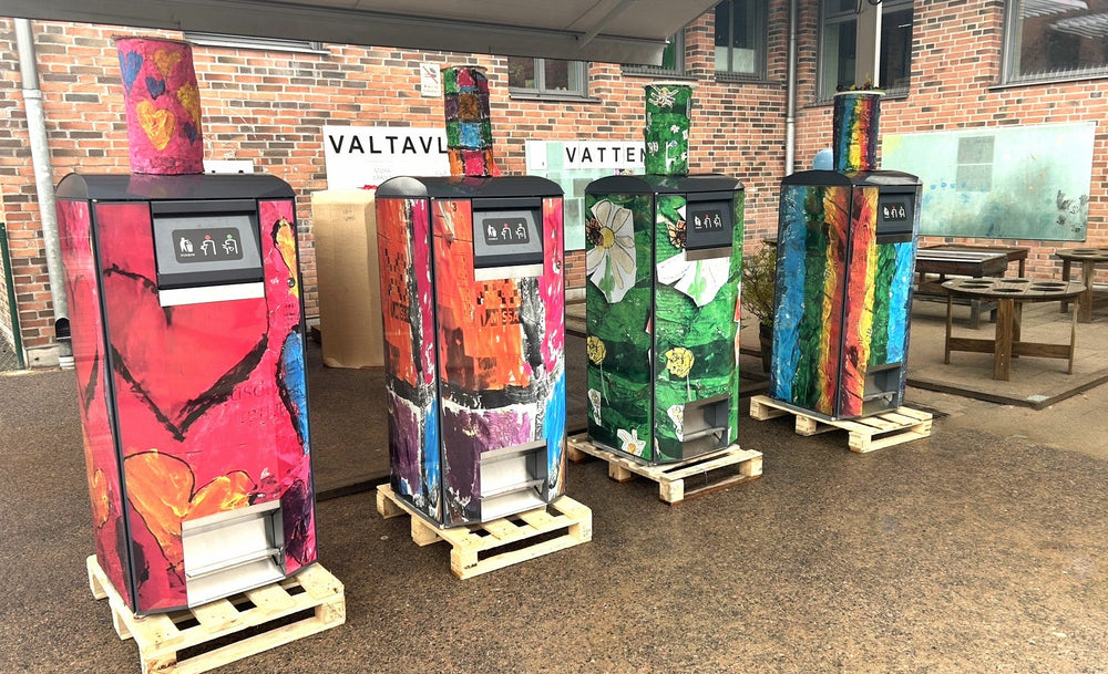 Children’s artwork on CityPack 120 litter bins in Gothenburg, Sweden