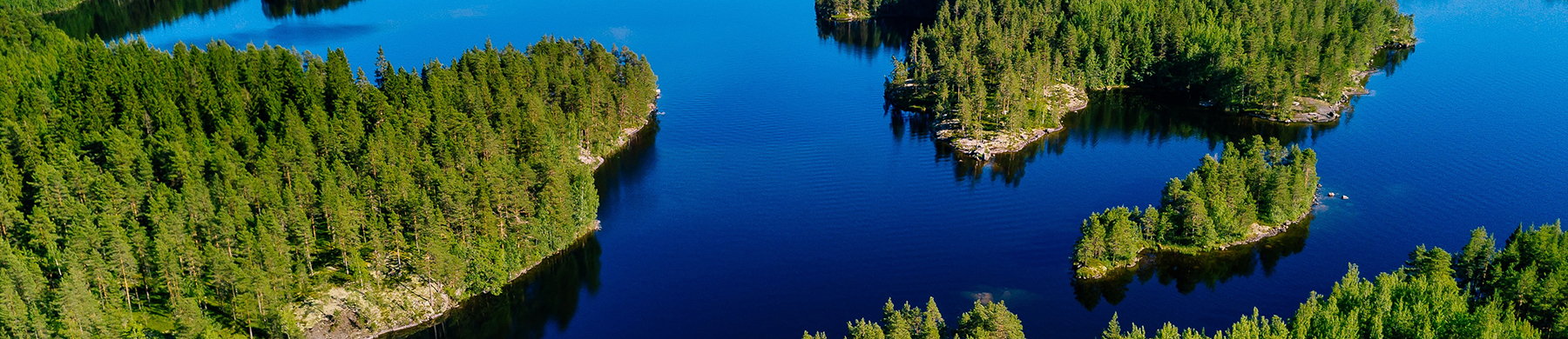 Finbin products are designed and Manufactured in Finland. The picture shows the Finnish nkey flag product logo and the Finnish lake landscape.